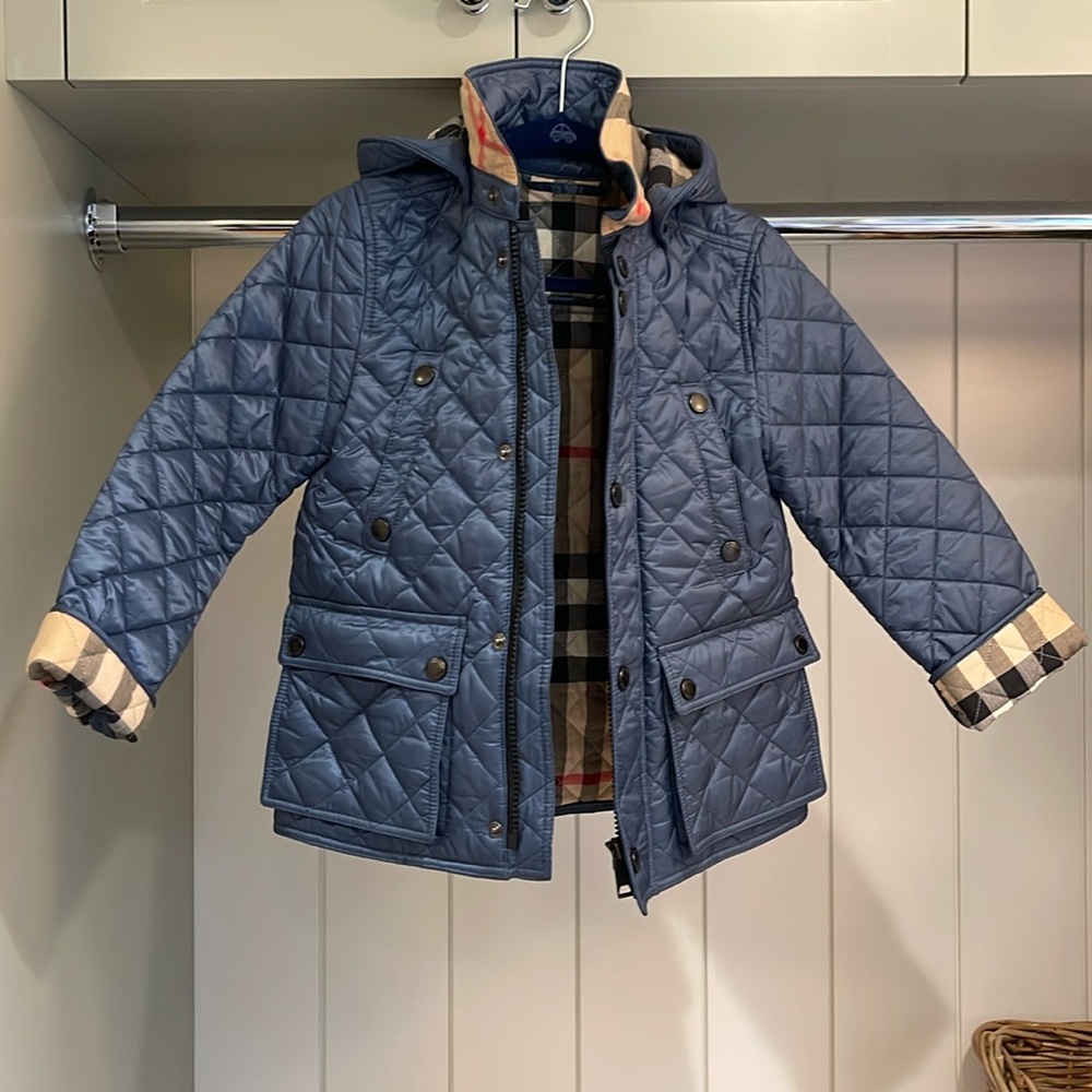Burberry coat size 5 years. Excellent condition. Fits more like a 4-5.